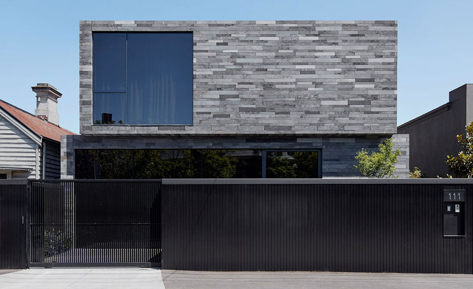 Lavastone Strip Veneer Planks Used on a Contemproary Residential Facade with Large Window