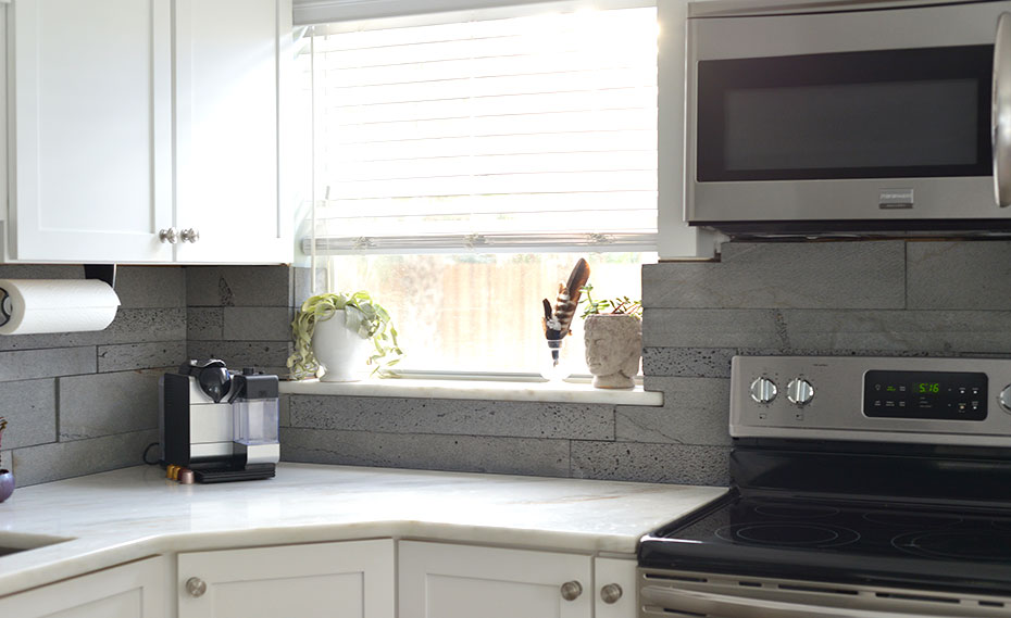 Stone Tiles Around Kitchen Window Well in Orlando Florida