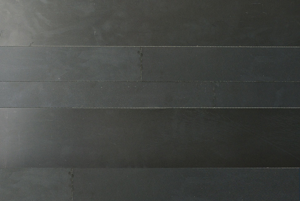 Large Format Wide Strip Veneer made from Ebony Basalt Stone - Cross section