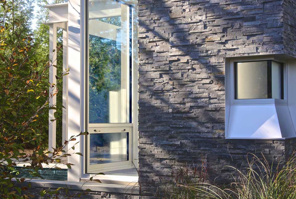 Earthy Grey Stacked Stone Veneer Panel used on Exterior home in Hamptons New York