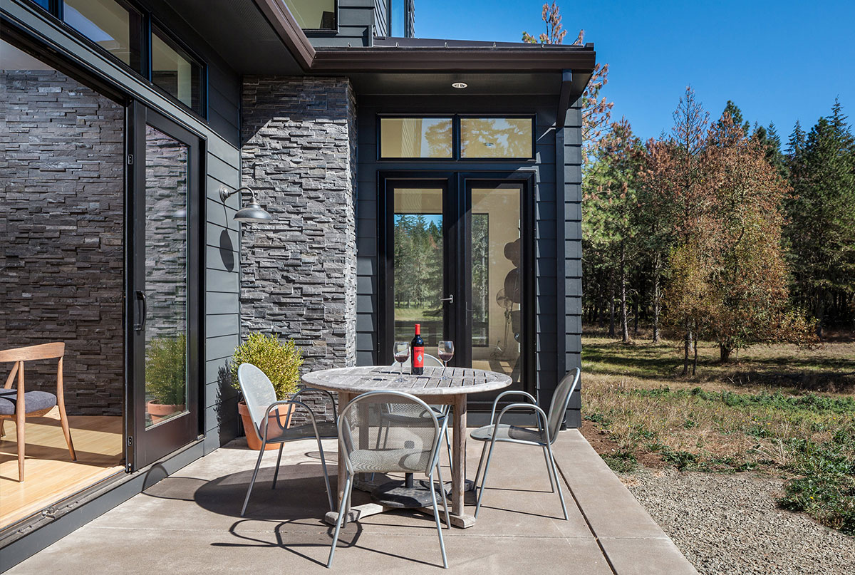 Norstone's Charcoal Panels used on Residential Exterior Wall near patio