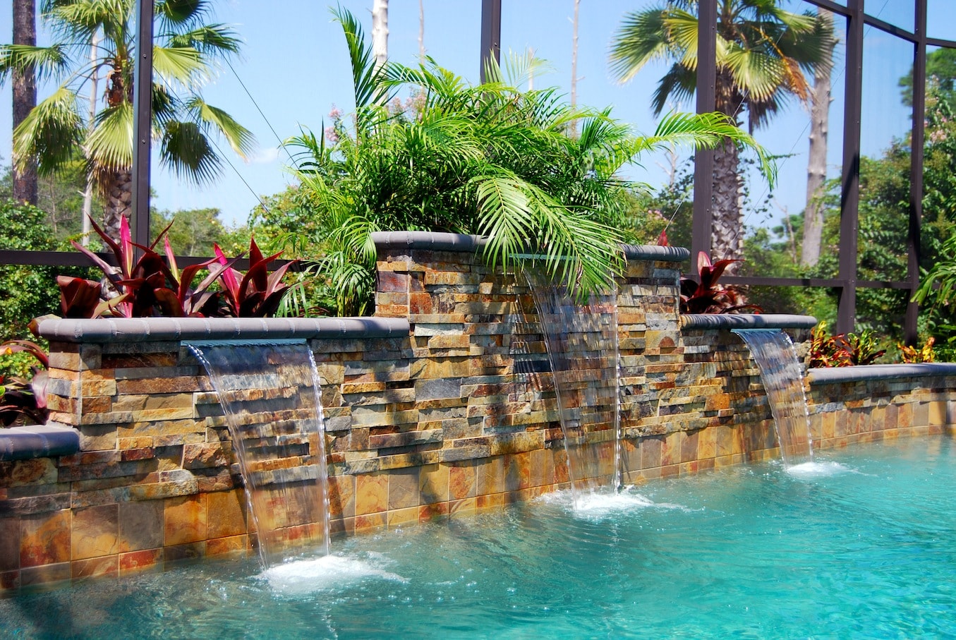 Ochre Stacked Stone Raised Beam Water Feature in Pool