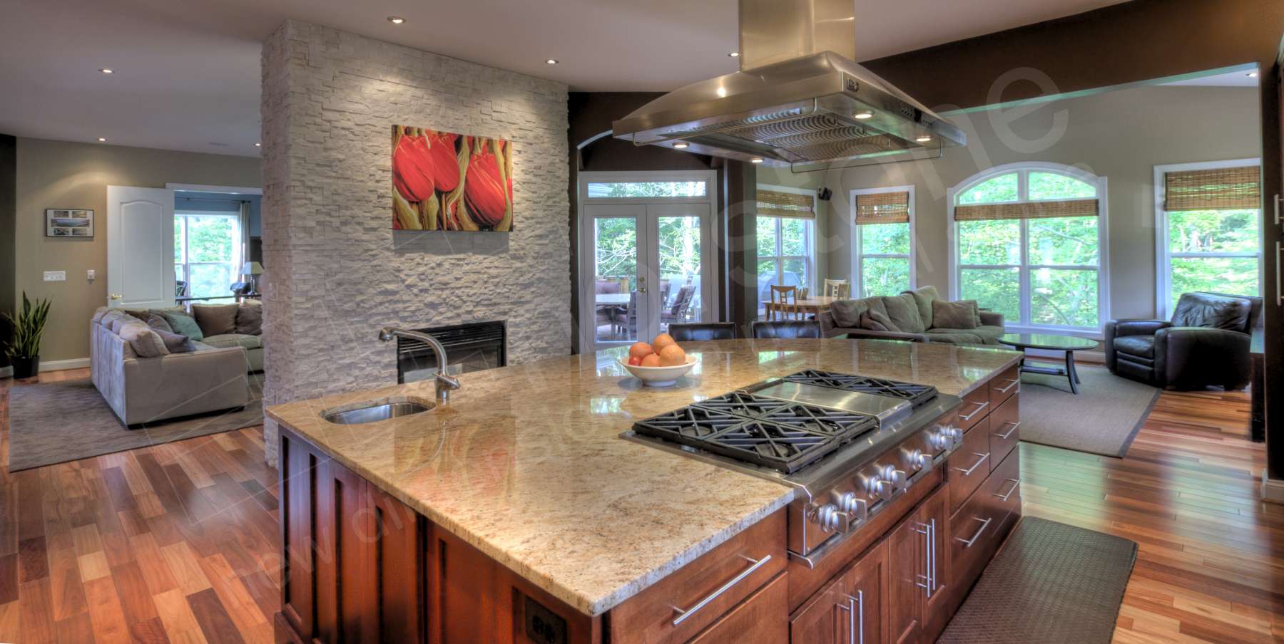 White Stacked Stone Fireplace Kitchen