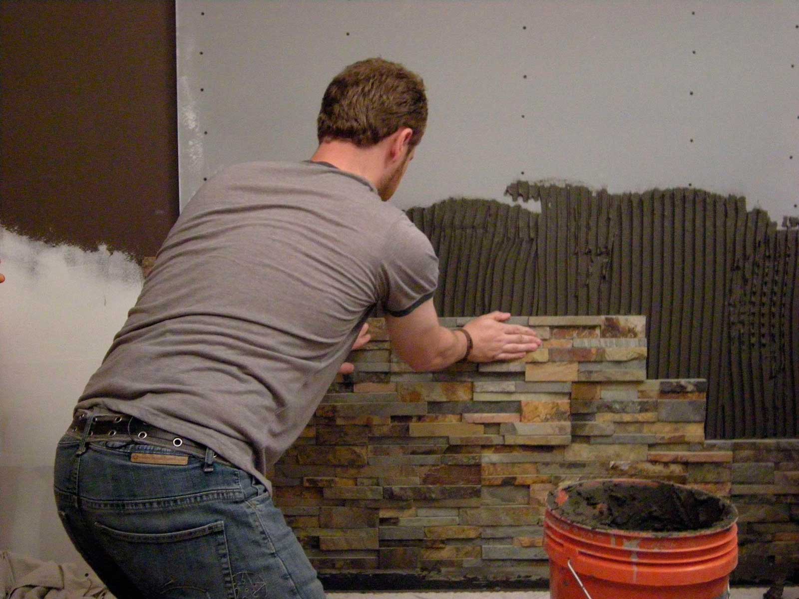 Norstone Ochre Stacked Stone Rock Panel Installation on DIY show Bathtastic