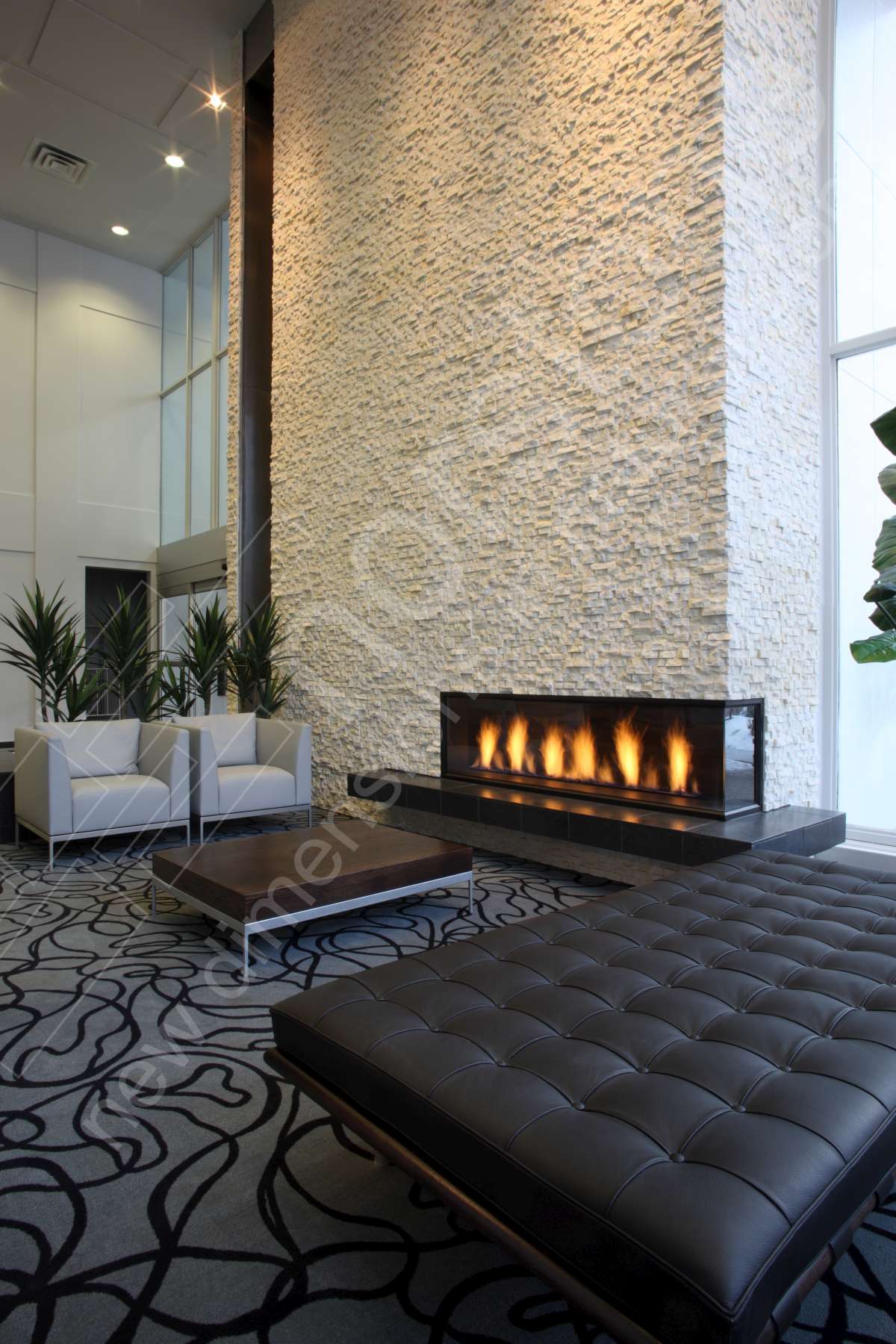 White Stacked Stone Modern Fireplace in Hotel Lobby Alberta Canada