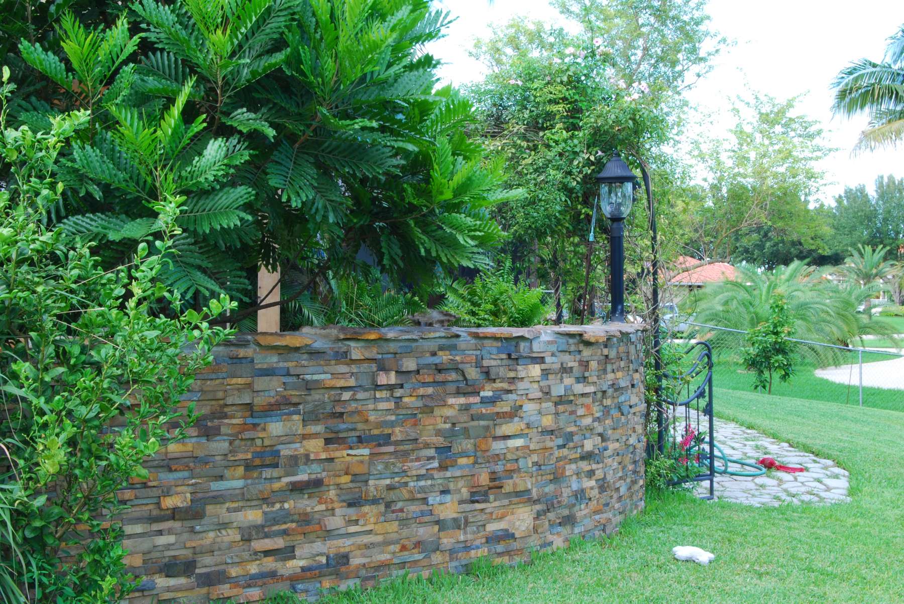 Stacked Stone Curved Garden Wall