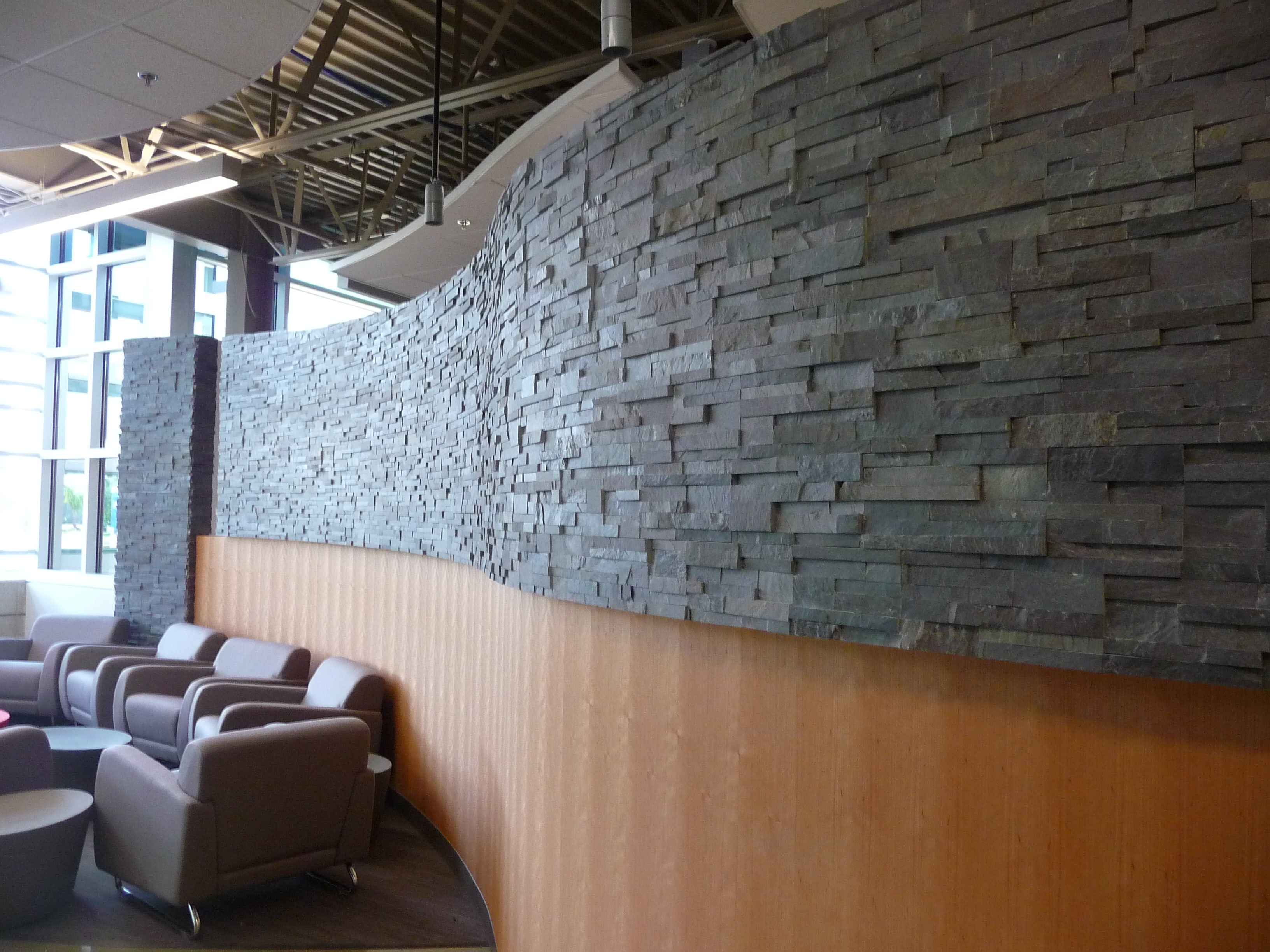 Stacked Stone Curved Wall University Lounge