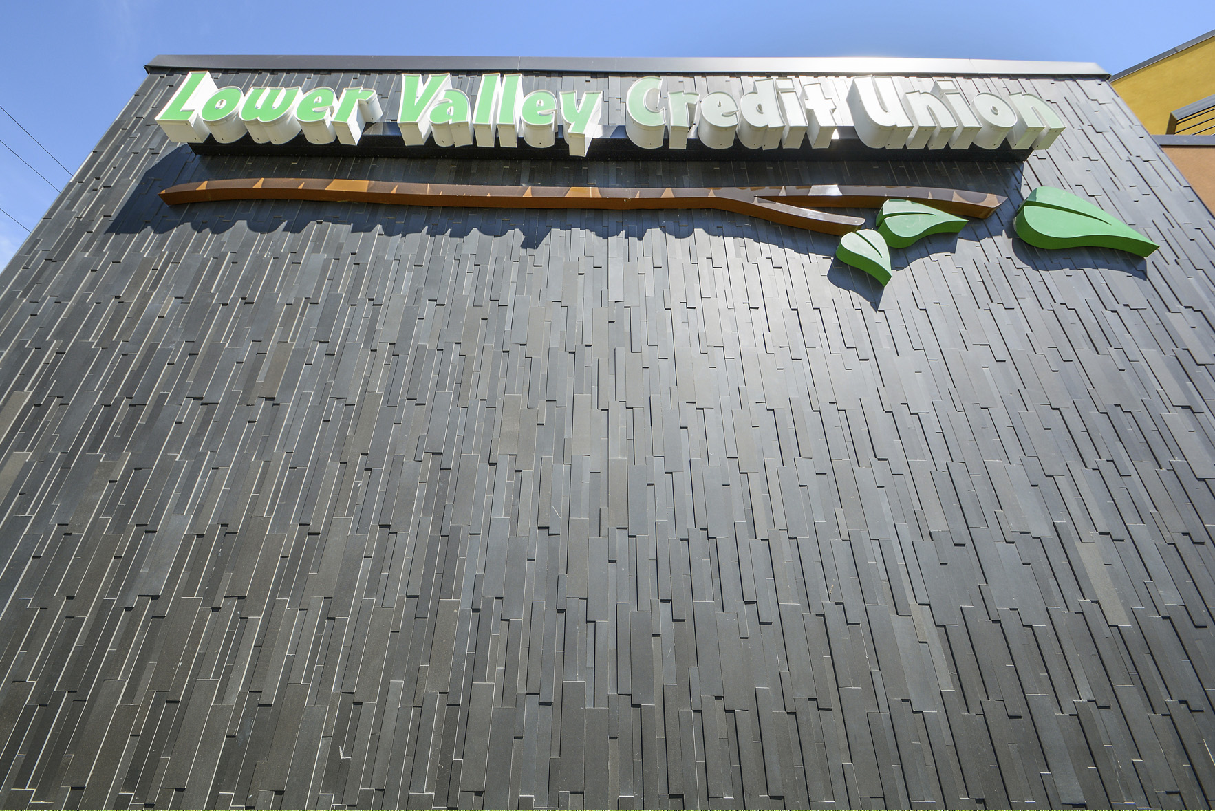 Basalt Ebony Stone Veneer used as the background on a bank's signage