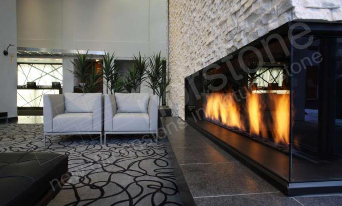 Cantilever Fireplace in Hotel Lobby with White Stone Veneer