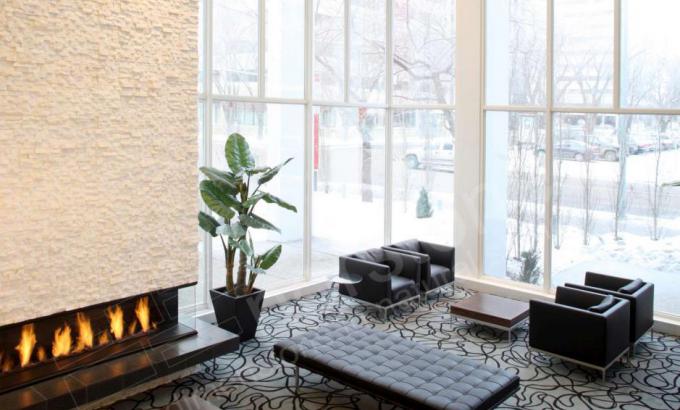 Two Story White Stone Veneer Fireplace in Alberta Canada