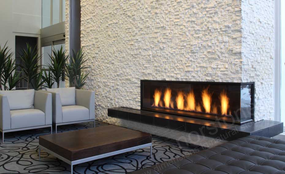 Modern White Fireplace with designer furniture in hotel lobby