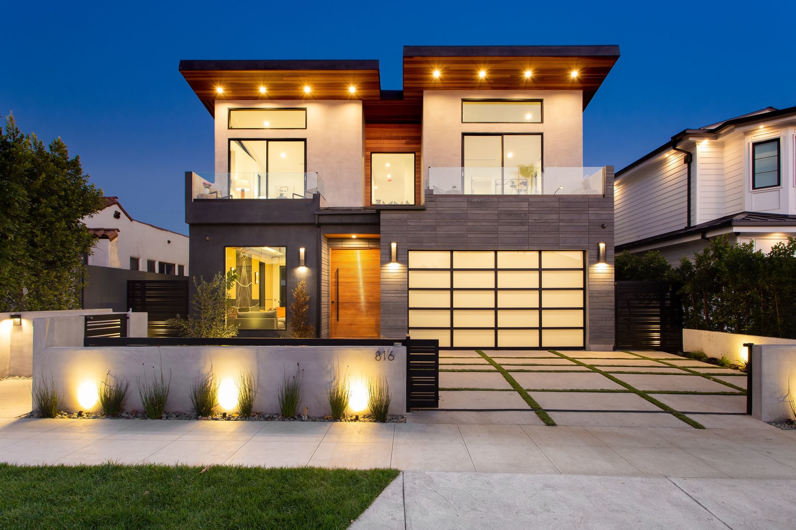 Norstone Platinum Planc large format tile used in a soldier stack pattern around the garage of a modern styled home in Hollywood, CA